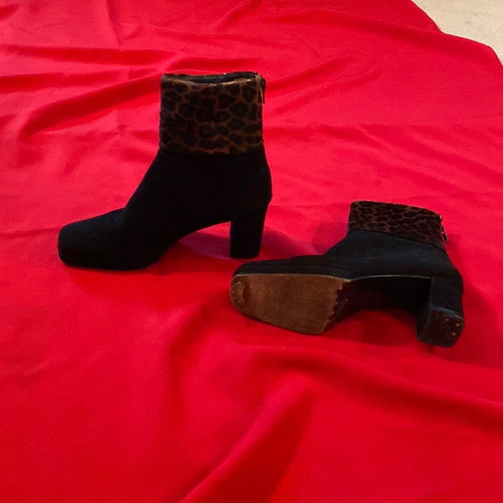 Stuart Weitzman black suede booties with jaguar print fur cuff .